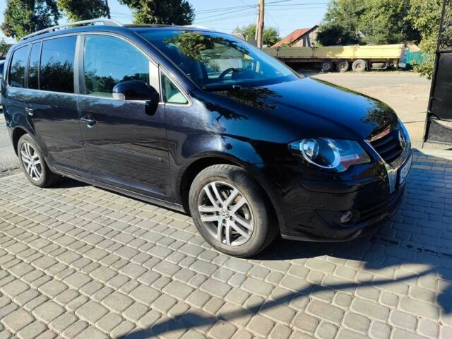 Черный Фольксваген Туран, объемом двигателя 1.9 л и пробегом 225 тыс. км за 7999 $, фото 1 на Automoto.ua