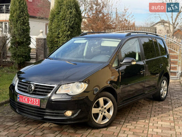 Чорний Фольксваген Туран, об'ємом двигуна 1.4 л та пробігом 148 тис. км за 5999 $, фото 1 на Automoto.ua