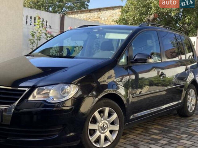 Чорний Фольксваген Туран, об'ємом двигуна 1.4 л та пробігом 270 тис. км за 6800 $, фото 1 на Automoto.ua
