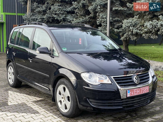 Черный Фольксваген Туран, объемом двигателя 1.4 л и пробегом 172 тыс. км за 6900 $, фото 1 на Automoto.ua