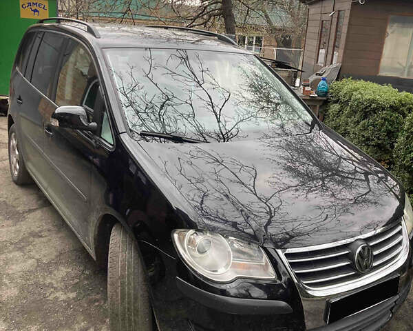 Чорний Фольксваген Туран, об'ємом двигуна 1.39 л та пробігом 195 тис. км за 7100 $, фото 1 на Automoto.ua