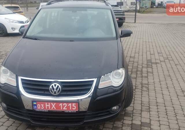 Чорний Фольксваген Туран, об'ємом двигуна 1.98 л та пробігом 291 тис. км за 7700 $, фото 1 на Automoto.ua