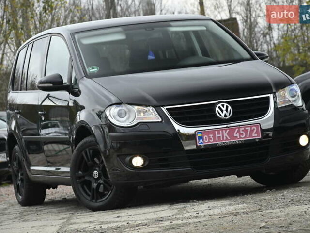Черный Фольксваген Туран, объемом двигателя 1.6 л и пробегом 152 тыс. км за 7600 $, фото 1 на Automoto.ua