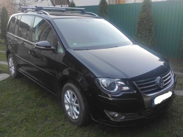 Чорний Фольксваген Туран, об'ємом двигуна 0 л та пробігом 207 тис. км за 7778 $, фото 1 на Automoto.ua