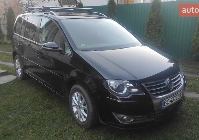 Черный Фольксваген Туран, объемом двигателя 1.39 л и пробегом 207 тыс. км за 7788 $, фото 1 на Automoto.ua
