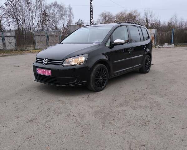 Чорний Фольксваген Туран, об'ємом двигуна 1.4 л та пробігом 234 тис. км за 8850 $, фото 1 на Automoto.ua