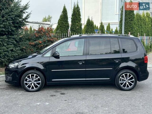 Черный Фольксваген Туран, объемом двигателя 1.97 л и пробегом 276 тыс. км за 12990 $, фото 1 на Automoto.ua