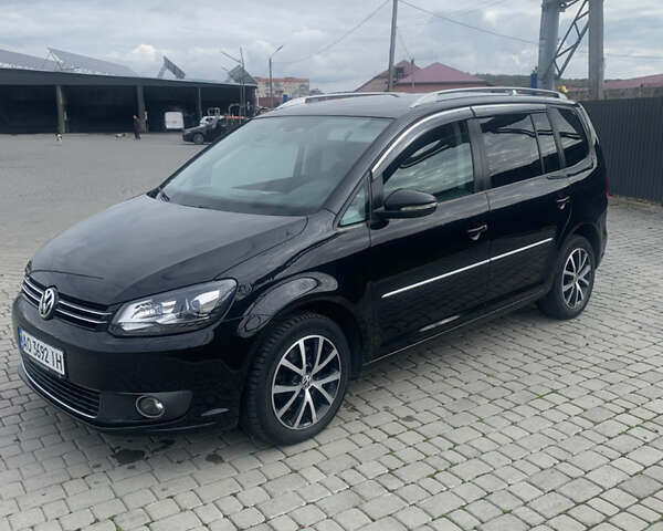 Черный Фольксваген Туран, объемом двигателя 1.97 л и пробегом 205 тыс. км за 12500 $, фото 1 на Automoto.ua