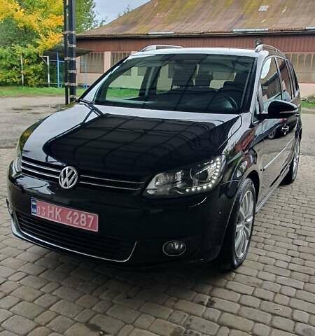 Черный Фольксваген Туран, объемом двигателя 1.98 л и пробегом 255 тыс. км за 12400 $, фото 1 на Automoto.ua