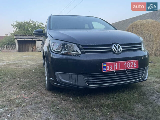 Черный Фольксваген Туран, объемом двигателя 1.39 л и пробегом 186 тыс. км за 9000 $, фото 1 на Automoto.ua