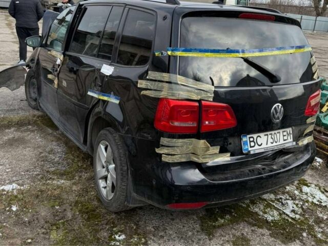 Черный Фольксваген Туран, объемом двигателя 1.4 л и пробегом 250 тыс. км за 520 $, фото 1 на Automoto.ua