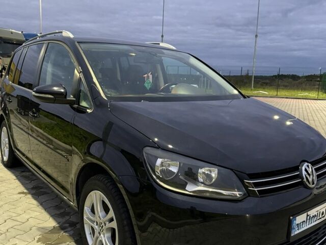 Черный Фольксваген Туран, объемом двигателя 1.6 л и пробегом 280 тыс. км за 11200 $, фото 1 на Automoto.ua