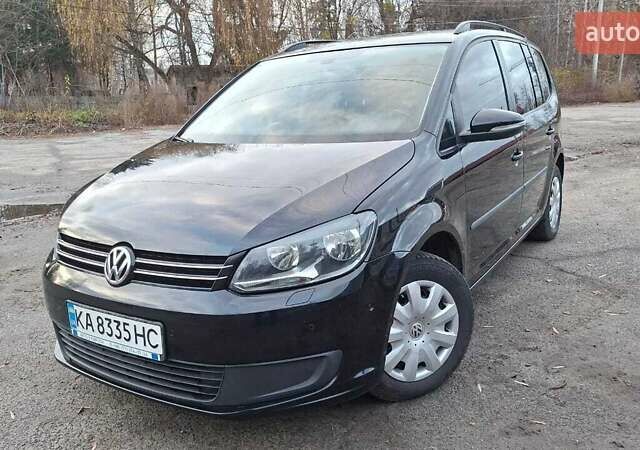 Черный Фольксваген Туран, объемом двигателя 1.6 л и пробегом 278 тыс. км за 9300 $, фото 1 на Automoto.ua