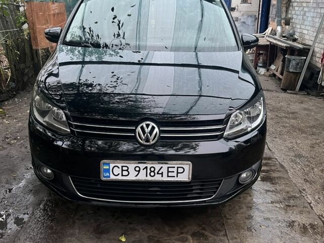 Черный Фольксваген Туран, объемом двигателя 1.4 л и пробегом 175 тыс. км за 7500 $, фото 1 на Automoto.ua