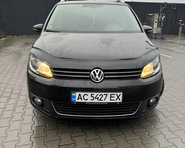 Черный Фольксваген Туран, объемом двигателя 1.97 л и пробегом 304 тыс. км за 12100 $, фото 1 на Automoto.ua