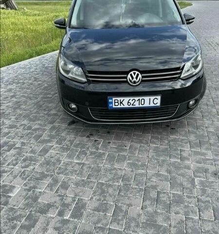 Черный Фольксваген Туран, объемом двигателя 1.4 л и пробегом 223 тыс. км за 7900 $, фото 1 на Automoto.ua