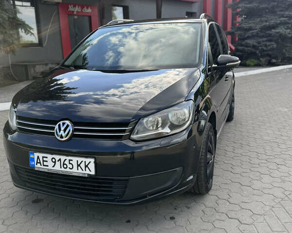 Черный Фольксваген Туран, объемом двигателя 1.39 л и пробегом 251 тыс. км за 7200 $, фото 1 на Automoto.ua