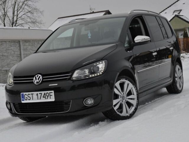 Чорний Фольксваген Туран, об'ємом двигуна 2 л та пробігом 230 тис. км за 6400 $, фото 1 на Automoto.ua