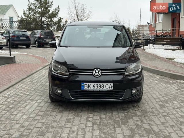 Чорний Фольксваген Туран, об'ємом двигуна 2 л та пробігом 195 тис. км за 10750 $, фото 1 на Automoto.ua