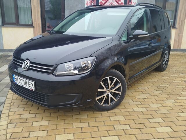 Черный Фольксваген Туран, объемом двигателя 1.6 л и пробегом 238 тыс. км за 9600 $, фото 1 на Automoto.ua