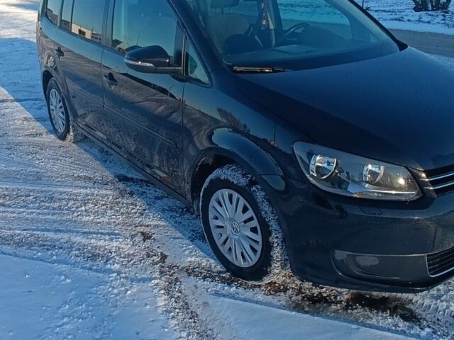 Черный Фольксваген Туран, объемом двигателя 1.6 л и пробегом 257 тыс. км за 8700 $, фото 1 на Automoto.ua