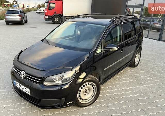 Черный Фольксваген Туран, объемом двигателя 1.6 л и пробегом 256 тыс. км за 8999 $, фото 1 на Automoto.ua