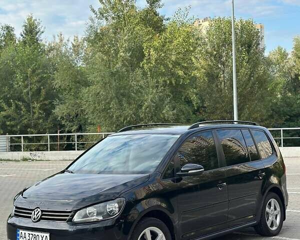 Черный Фольксваген Туран, объемом двигателя 1.6 л и пробегом 230 тыс. км за 10950 $, фото 1 на Automoto.ua