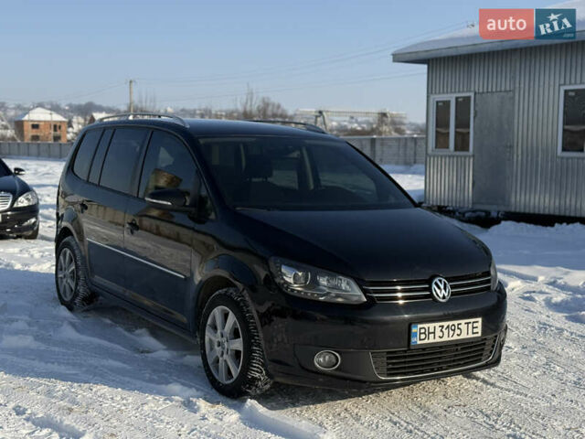 Чорний Фольксваген Туран, об'ємом двигуна 1.97 л та пробігом 296 тис. км за 12499 $, фото 1 на Automoto.ua