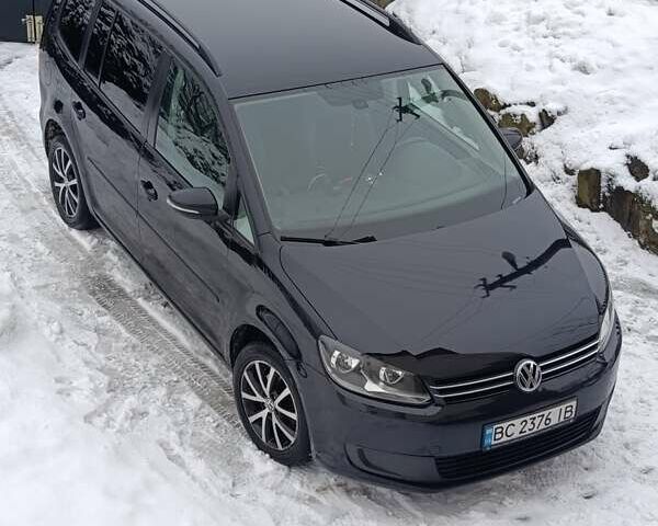 Чорний Фольксваген Туран, об'ємом двигуна 1.6 л та пробігом 250 тис. км за 11300 $, фото 1 на Automoto.ua