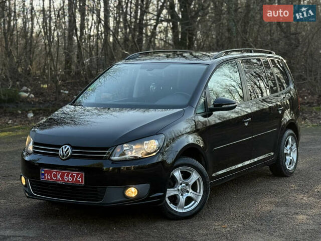 Черный Фольксваген Туран, объемом двигателя 1.6 л и пробегом 236 тыс. км за 9750 $, фото 1 на Automoto.ua