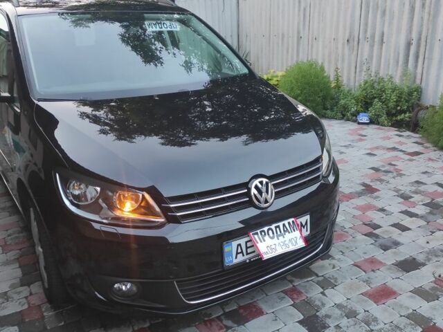 Черный Фольксваген Туран, объемом двигателя 2 л и пробегом 200 тыс. км за 12800 $, фото 1 на Automoto.ua