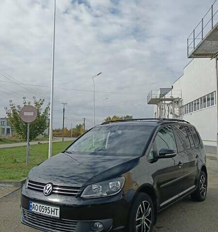 Черный Фольксваген Туран, объемом двигателя 1.97 л и пробегом 101 тыс. км за 12500 $, фото 1 на Automoto.ua