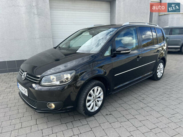 Чорний Фольксваген Туран, об'ємом двигуна 1.97 л та пробігом 189 тис. км за 12400 $, фото 1 на Automoto.ua