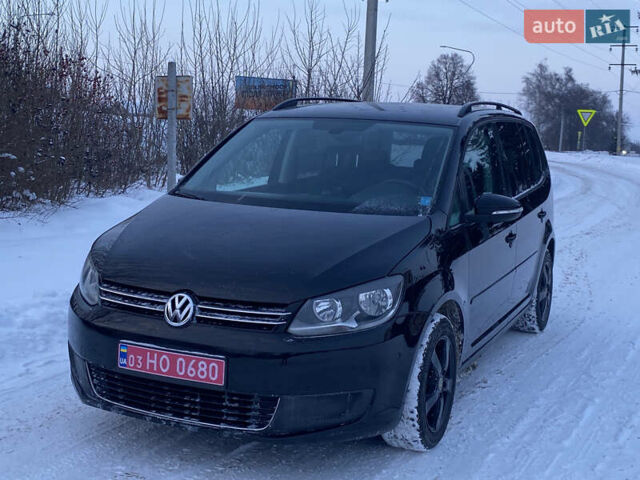 Черный Фольксваген Туран, объемом двигателя 1.39 л и пробегом 213 тыс. км за 9700 $, фото 1 на Automoto.ua