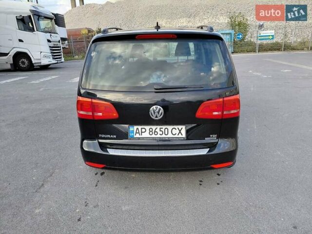 Чорний Фольксваген Туран, об'ємом двигуна 1.6 л та пробігом 335 тис. км за 11588 $, фото 1 на Automoto.ua
