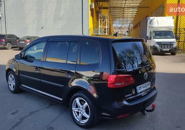 Черный Фольксваген Туран, объемом двигателя 1.97 л и пробегом 344 тыс. км за 10500 $, фото 1 на Automoto.ua
