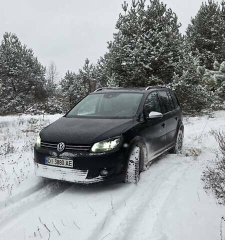 Черный Фольксваген Туран, объемом двигателя 1.97 л и пробегом 320 тыс. км за 9600 $, фото 1 на Automoto.ua