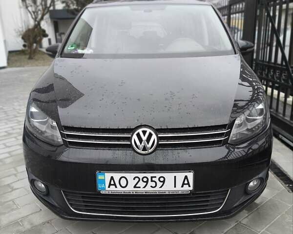 Черный Фольксваген Туран, объемом двигателя 1.97 л и пробегом 300 тыс. км за 13000 $, фото 1 на Automoto.ua