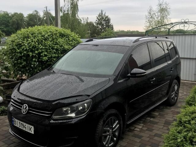 Чорний Фольксваген Туран, об'ємом двигуна 1.4 л та пробігом 280 тис. км за 11000 $, фото 1 на Automoto.ua