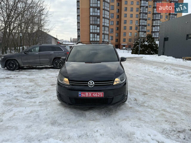 Черный Фольксваген Туран, объемом двигателя 1.4 л и пробегом 230 тыс. км за 7800 $, фото 1 на Automoto.ua