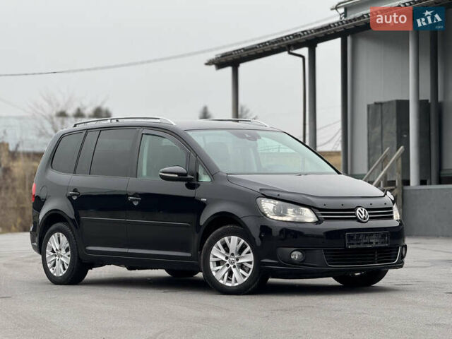 Чорний Фольксваген Туран, об'ємом двигуна 1.97 л та пробігом 243 тис. км за 12550 $, фото 1 на Automoto.ua