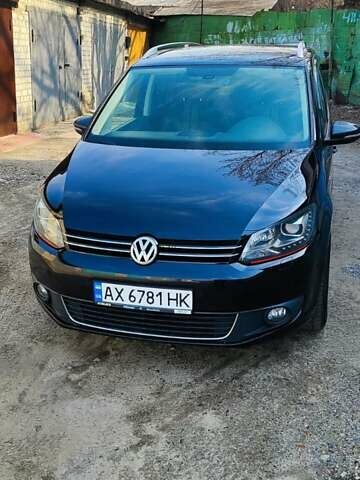 Черный Фольксваген Туран, объемом двигателя 2 л и пробегом 234 тыс. км за 12400 $, фото 1 на Automoto.ua