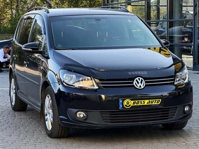 Черный Фольксваген Туран, объемом двигателя 1.6 л и пробегом 270 тыс. км за 11600 $, фото 1 на Automoto.ua