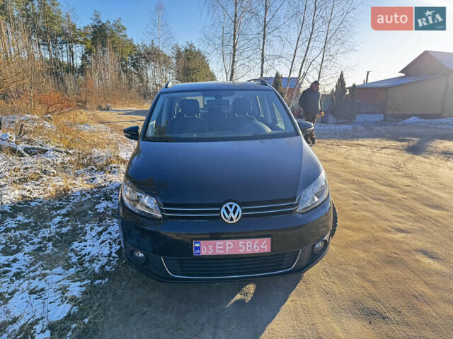 Черный Фольксваген Туран, объемом двигателя 2 л и пробегом 240 тыс. км за 12500 $, фото 1 на Automoto.ua