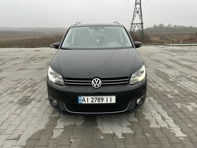 Черный Фольксваген Туран, объемом двигателя 2 л и пробегом 340 тыс. км за 9000 $, фото 1 на Automoto.ua