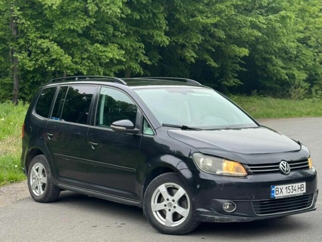 Черный Фольксваген Туран, объемом двигателя 1.4 л и пробегом 297 тыс. км за 7800 $, фото 1 на Automoto.ua