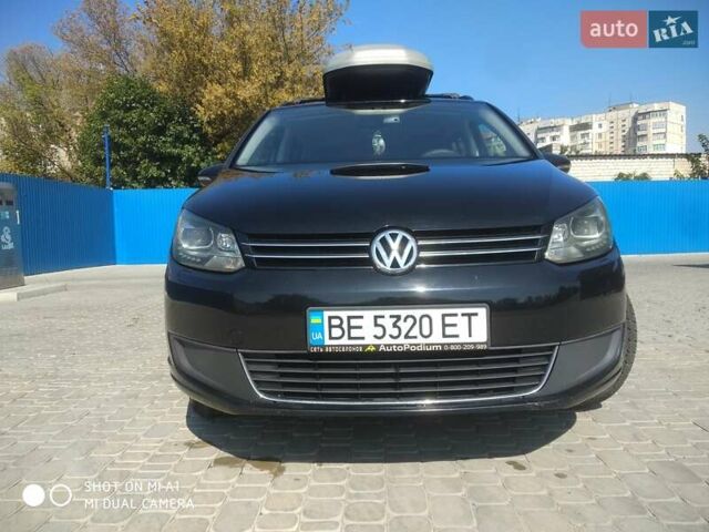 Черный Фольксваген Туран, объемом двигателя 1.39 л и пробегом 180 тыс. км за 8500 $, фото 1 на Automoto.ua