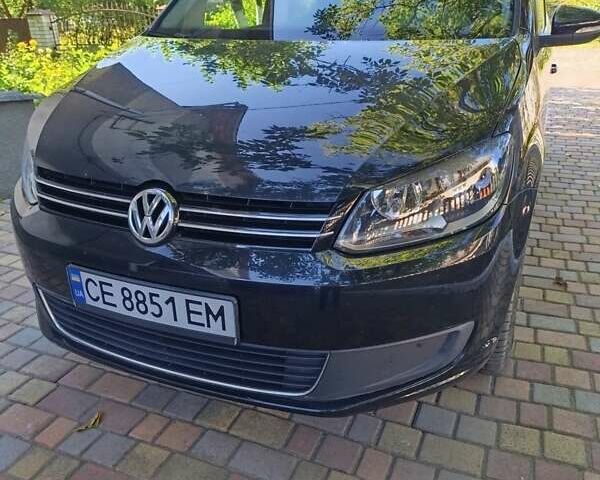 Черный Фольксваген Туран, объемом двигателя 1.6 л и пробегом 267 тыс. км за 11700 $, фото 1 на Automoto.ua