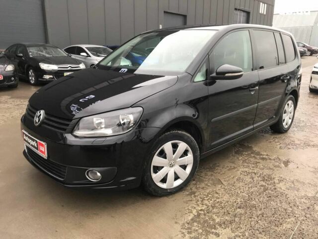 Черный Фольксваген Туран, объемом двигателя 1.6 л и пробегом 273 тыс. км за 11490 $, фото 1 на Automoto.ua