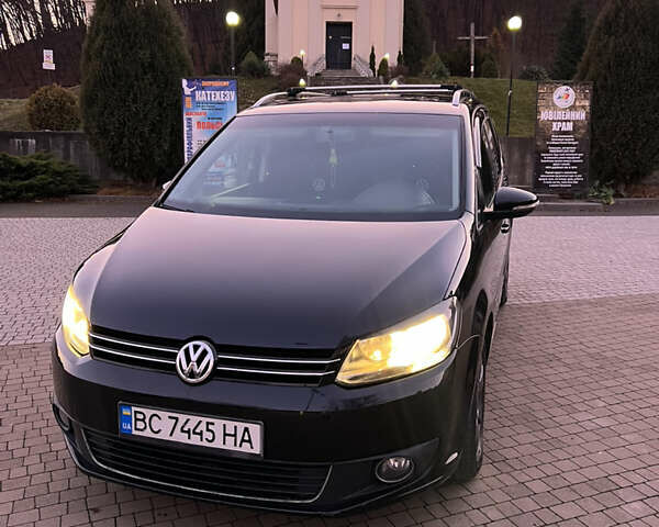Черный Фольксваген Туран, объемом двигателя 1.6 л и пробегом 325 тыс. км за 12300 $, фото 1 на Automoto.ua